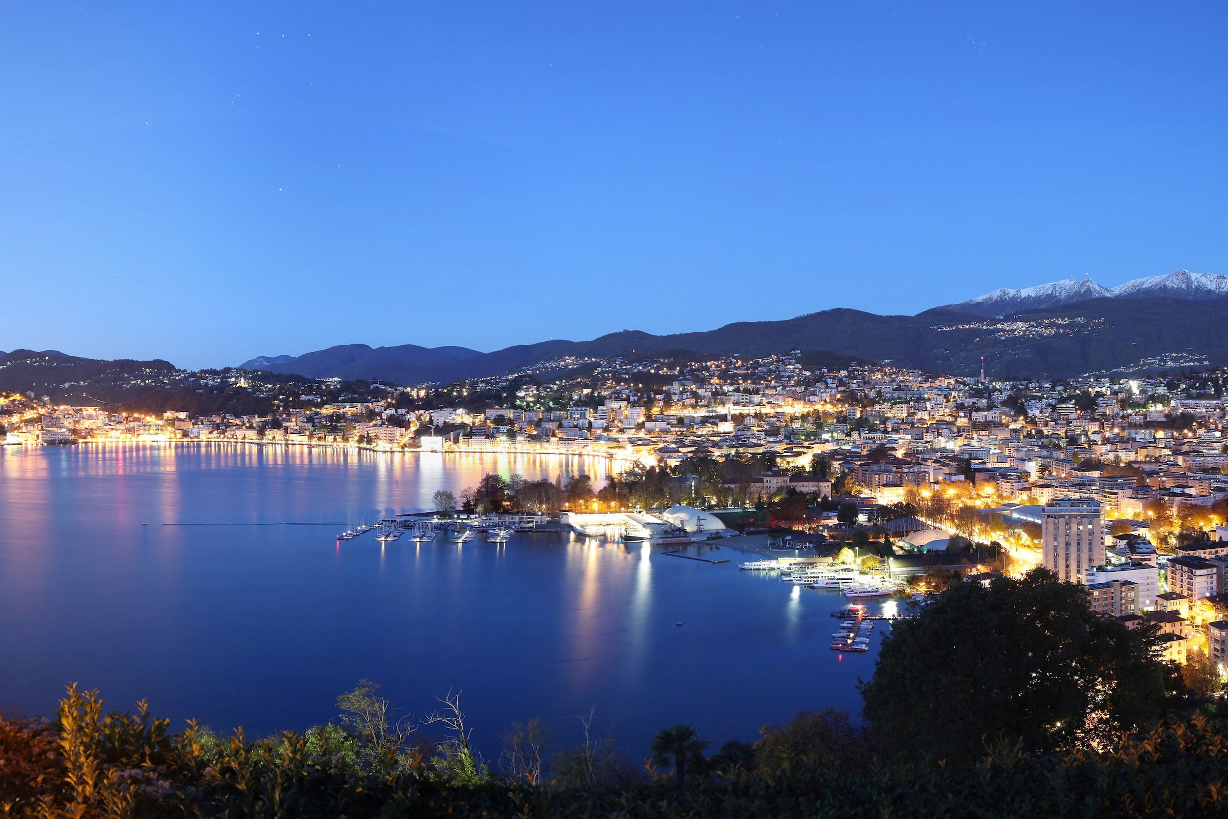 Lugano city by night at Lake Lugano, Ticino, Switzerland